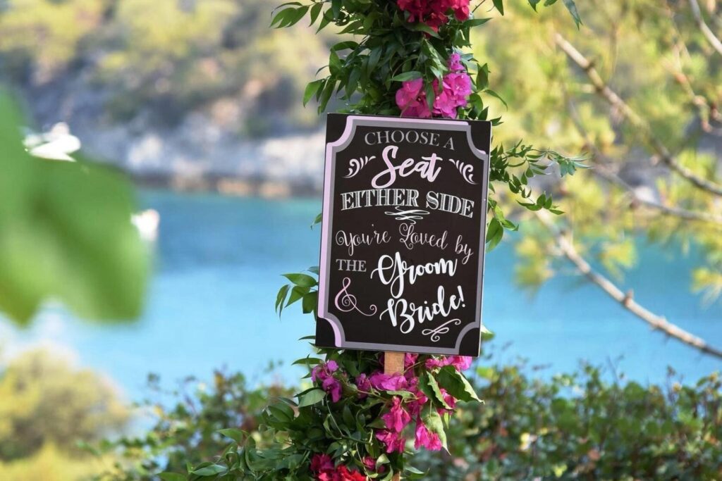 Choose-a-seat-sign-bride-and-groom